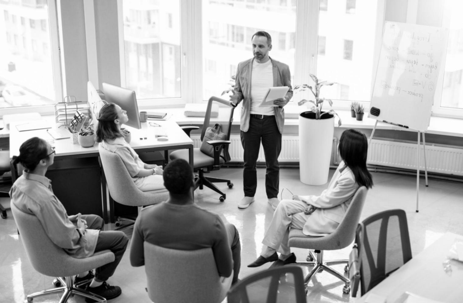 Modern workspace with financial data and investment research materials